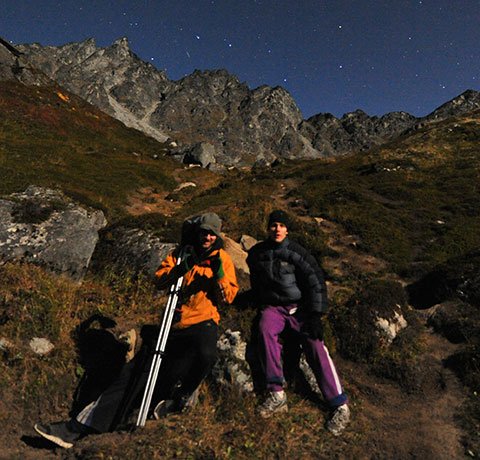 Poul Jensen, hiking with the tools of his trade.